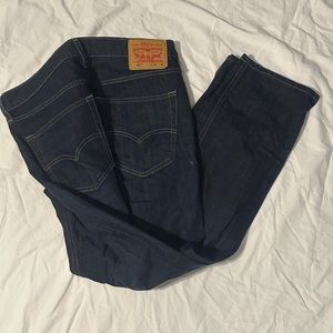 Dark colored men’s Levi blue jeans, size 32 x32.
